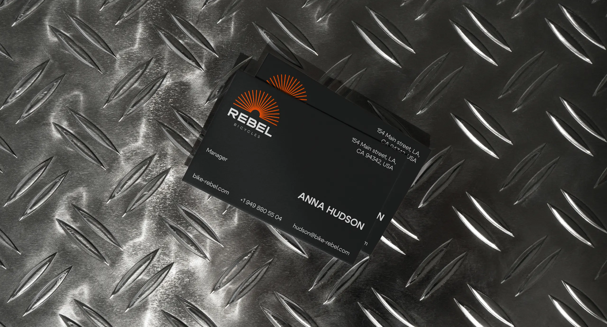 Дизайн персональних брендованих візитівок Rebel Bicycles.